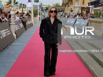 Isabelle Huppert attends the red carpet of the film Yeohaengjaui Pilyo during the 72nd San Sebastian International Film Festival in San Seba...