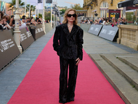 Isabelle Huppert attends the red carpet of the film Yeohaengjaui Pilyo during the 72nd San Sebastian International Film Festival in San Seba...