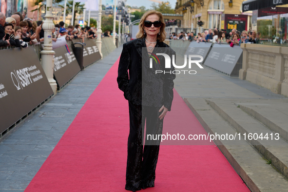 Isabelle Huppert attends the red carpet of the film Yeohaengjaui Pilyo during the 72nd San Sebastian International Film Festival in San Seba...