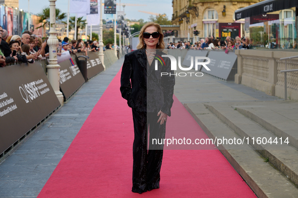 Isabelle Huppert attends the red carpet of the film Yeohaengjaui Pilyo during the 72nd San Sebastian International Film Festival in San Seba...