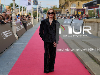 Isabelle Huppert attends the red carpet of the film Yeohaengjaui Pilyo during the 72nd San Sebastian International Film Festival in San Seba...