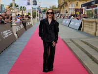 Isabelle Huppert attends the red carpet of the film Yeohaengjaui Pilyo during the 72nd San Sebastian International Film Festival in San Seba...