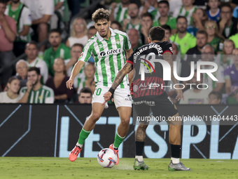 Ez Abde of Real Betis battles for the ball during the La Liga EA Sports match between Real Betis and RCD Mallorca at Benito Villamarin in Se...