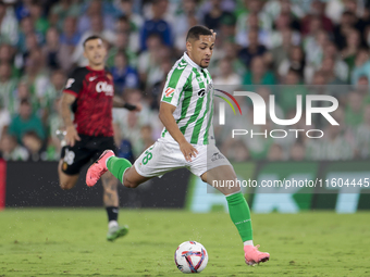 Vitor Roque of Real Betis hits the ball during the La Liga EA Sports match between Real Betis and RCD Mallorca at Benito Villamarin in Sevil...