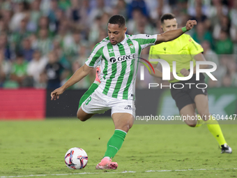 Vitor Roque of Real Betis hits the ball during the La Liga EA Sports match between Real Betis and RCD Mallorca at Benito Villamarin in Sevil...