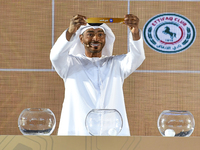 A member of the organizing committee shows the name of Al Nasr of the United Arab Emirates during the 2024-25 Gulf Club Champions League dra...