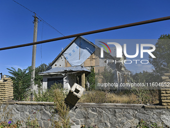 A building is destroyed by Russian shelling on the territory of the Vozdvyzhivka territorial community in Zaporizhzhia region, southeastern...