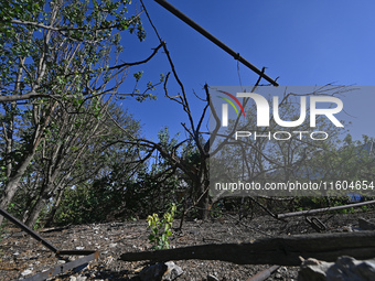 A tree breaks as a result of Russian shelling on the territory of the Vozdvyzhivka territorial community in Zaporizhzhia region, southeaster...