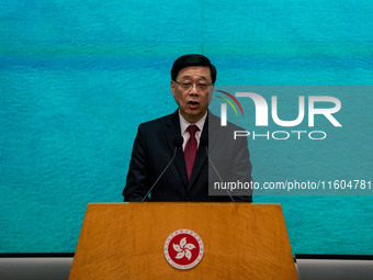 Hong Kong Chief Executive John Lee speaks at a press conference before his Executive Council meeting in Hong Kong, China, on September 24, 2...