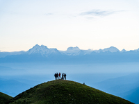 Domestic tourists view the morning scenery of the mountain range from Sailung Hill in Dolakha, Nepal, on September 23, 2024. (