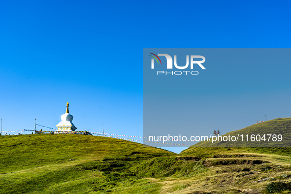 Domestic tourists hike on Sailung Hill in Dolakha, Nepal, on September 23, 2024. 