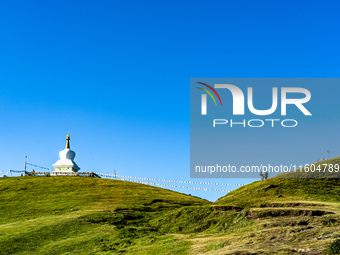 Domestic tourists hike on Sailung Hill in Dolakha, Nepal, on September 23, 2024. (