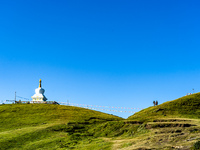 Domestic tourists hike on Sailung Hill in Dolakha, Nepal, on September 23, 2024. (