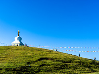 Domestic tourists hike on Sailung Hill in Dolakha, Nepal, on September 23, 2024. (