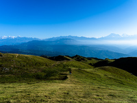 Domestic tourists hike on Sailung Hill in Dolakha, Nepal, on September 23, 2024. (