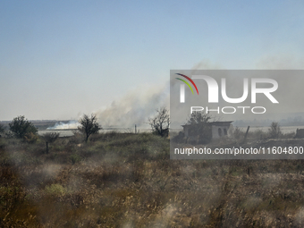 Fires burn along the road from Kurakhove to Hirnyk as a result of Russian artillery shelling in Pokrovsk district, Donetsk region, eastern U...