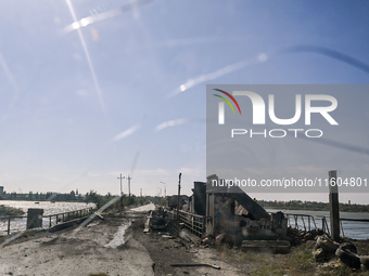 The dam of the Kurakhove Reservoir is seen after a Russian shelling in Pokrovsk district, Donetsk region, eastern Ukraine, on September 16,...