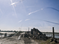 The dam of the Kurakhove Reservoir is seen after a Russian shelling in Pokrovsk district, Donetsk region, eastern Ukraine, on September 16,...