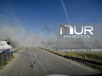 Fires burn along the road from Kurakhove to Hirnyk as a result of Russian artillery shelling in Pokrovsk district, Donetsk region, eastern U...