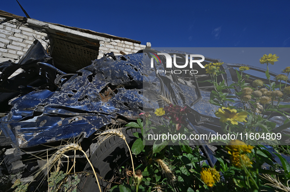 A car destroyed by Russian shelling on the territory of the Vozdvyzhivka territorial community in Zaporizhzhia region, southeastern Ukraine,...