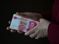 Chinese Yuan banknotes are pictured in Fuyang, China, on September 24, 2024. On September 24, the People's Bank of China announces that it w...