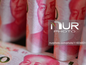 Chinese Yuan banknotes are pictured in Fuyang, China, on September 24, 2024. On September 24, the People's Bank of China announces that it w...