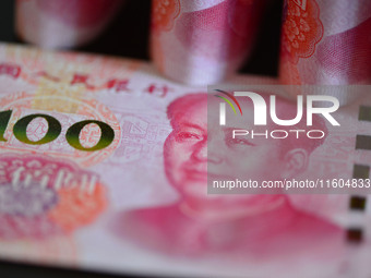 Chinese Yuan banknotes are pictured in Fuyang, China, on September 24, 2024. On September 24, the People's Bank of China announces that it w...