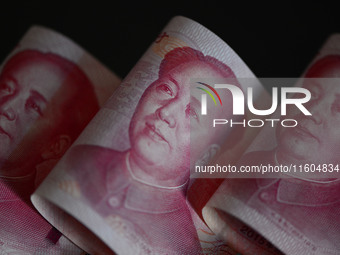 Chinese Yuan banknotes are pictured in Fuyang, China, on September 24, 2024. On September 24, the People's Bank of China announces that it w...