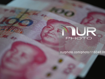 Chinese Yuan banknotes are pictured in Fuyang, China, on September 24, 2024. On September 24, the People's Bank of China announces that it w...