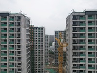 A view from the air shows a newly built commercial housing complex in Hangzhou, China, on September 24, 2024. On the same day, the People's...