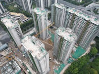 A view from the air shows a newly built commercial housing complex in Hangzhou, China, on September 24, 2024. On the same day, the People's...