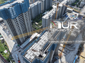 A China Resources property is under construction in Nanjing, Jiangsu province, China, on September 24, 2024. The People's Bank of China anno...