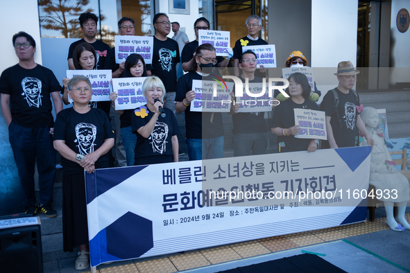 Artists and cultural figures hold a press conference in front of the German Embassy, protesting against the removal of the Peace Statue in B...