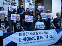 Artists and cultural figures hold a press conference in front of the German Embassy, protesting against the removal of the Peace Statue in B...