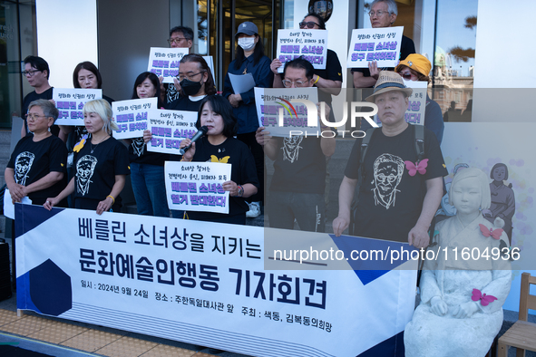 Artists and cultural figures hold a press conference in front of the German Embassy, protesting against the removal of the Peace Statue in B...