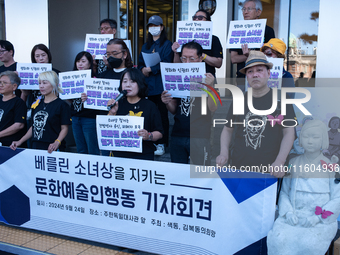 Artists and cultural figures hold a press conference in front of the German Embassy, protesting against the removal of the Peace Statue in B...