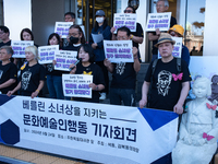 Artists and cultural figures hold a press conference in front of the German Embassy, protesting against the removal of the Peace Statue in B...