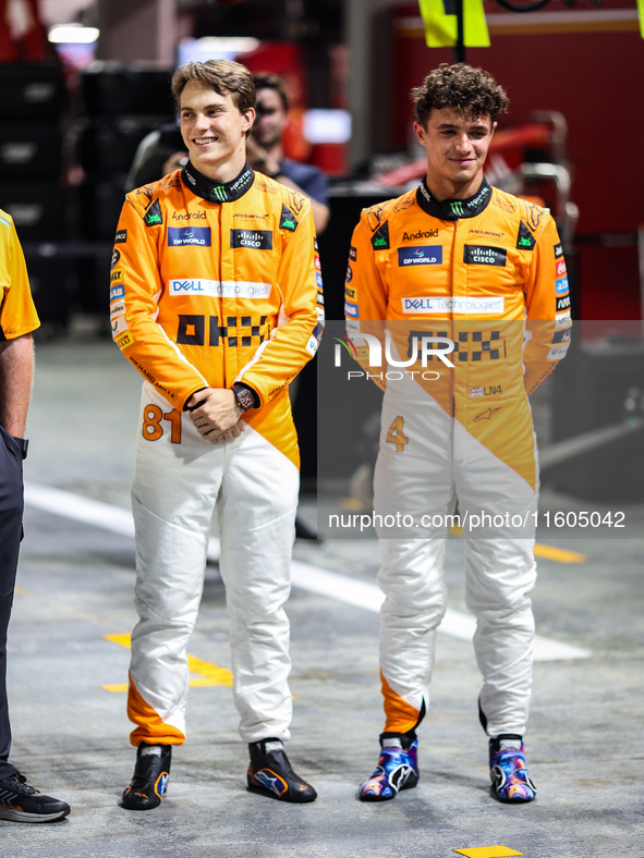 Oscar Piastri of McLaren F1 Team MCL38 and Lando Norris of McLaren F1 Team MCL38 pose for a portrait during the Formula 1 Singapore Grand Pr...