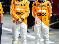 Oscar Piastri of McLaren F1 Team MCL38 and Lando Norris of McLaren F1 Team MCL38 pose for a portrait during the Formula 1 Singapore Grand Pr...