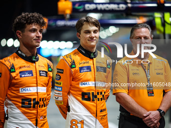 Zak Brown, CEO of McLaren F1 Team, Oscar Piastri of McLaren F1 Team MCL38, and Lando Norris of McLaren F1 Team MCL38, pose for a portrait du...