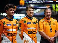 Zak Brown, CEO of McLaren F1 Team, Oscar Piastri of McLaren F1 Team MCL38, and Lando Norris of McLaren F1 Team MCL38, pose for a portrait du...