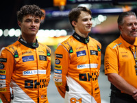 Zak Brown, CEO of McLaren F1 Team, Oscar Piastri of McLaren F1 Team MCL38, and Lando Norris of McLaren F1 Team MCL38, pose for a portrait du...