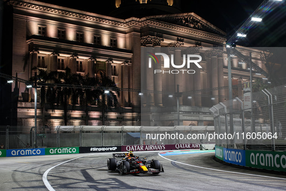 Sergio Perez of Red Bull Racing RB20 competes during the Formula 1 Singapore Grand Prix 2024 on the Marina Bay Circuit in Singapore, from Se...