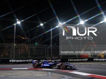 Alexander Albon of Williams Racing FW45 participates in the Formula 1 Singapore Grand Prix 2024 on the Marina Bay Circuit in Singapore from...