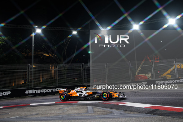 Oscar Piastri of the McLaren F1 Team MCL38 participates in the Formula 1 Singapore Grand Prix 2024 on the Marina Bay Circuit in Singapore fr...