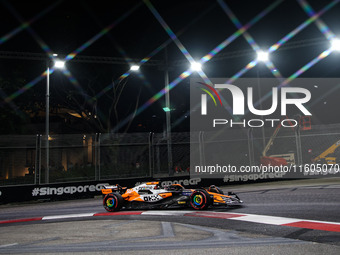 Oscar Piastri of the McLaren F1 Team MCL38 participates in the Formula 1 Singapore Grand Prix 2024 on the Marina Bay Circuit in Singapore fr...