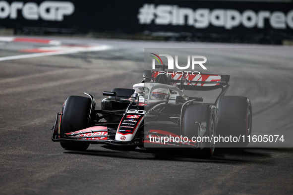 Kevin Magnussen of Haas F1 Team VF-24 Ferrari competes during the Formula 1 Singapore Grand Prix 2024 on the Marina Bay Circuit in Singapore...