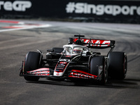 Kevin Magnussen of Haas F1 Team VF-24 Ferrari competes during the Formula 1 Singapore Grand Prix 2024 on the Marina Bay Circuit in Singapore...