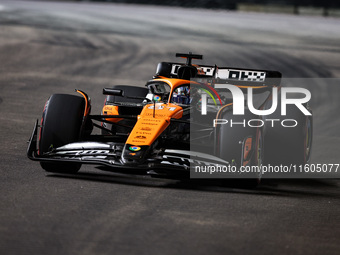 Oscar Piastri of the McLaren F1 Team MCL38 participates in the Formula 1 Singapore Grand Prix 2024 on the Marina Bay Circuit in Singapore fr...