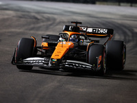 Oscar Piastri of the McLaren F1 Team MCL38 participates in the Formula 1 Singapore Grand Prix 2024 on the Marina Bay Circuit in Singapore fr...